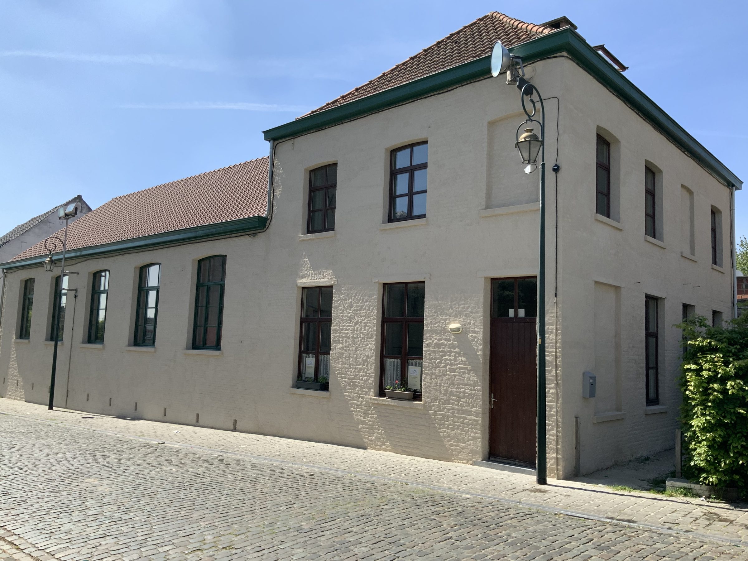 Bâtiment ancien rénové avec un enduit à la chaux